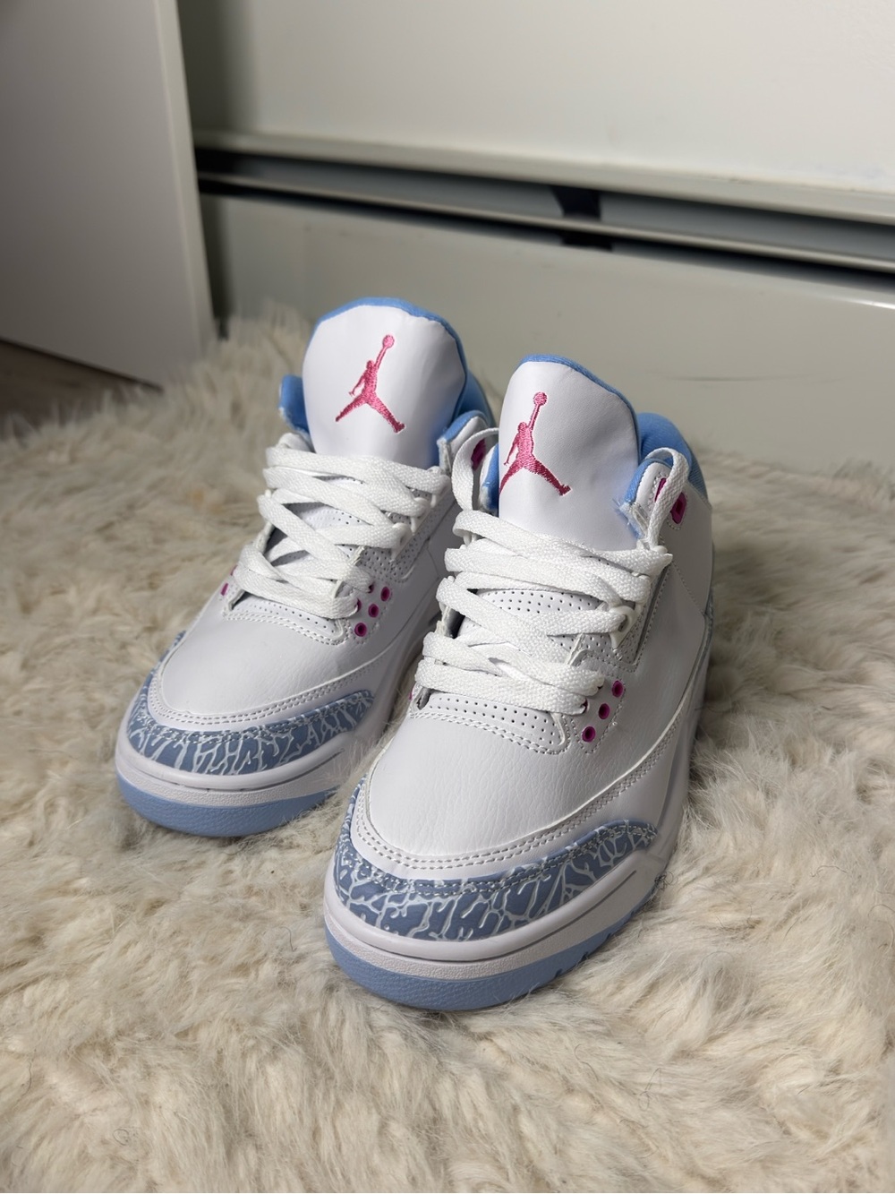 Jordan White and Light Blue Basketball Shoes with Pink Accents